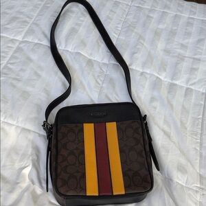 Coach Men’s Brown Signature Messenger Bag with Yellow & Red Stripes